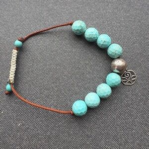 Turquoise Beaded Bracelet with Silver Charm